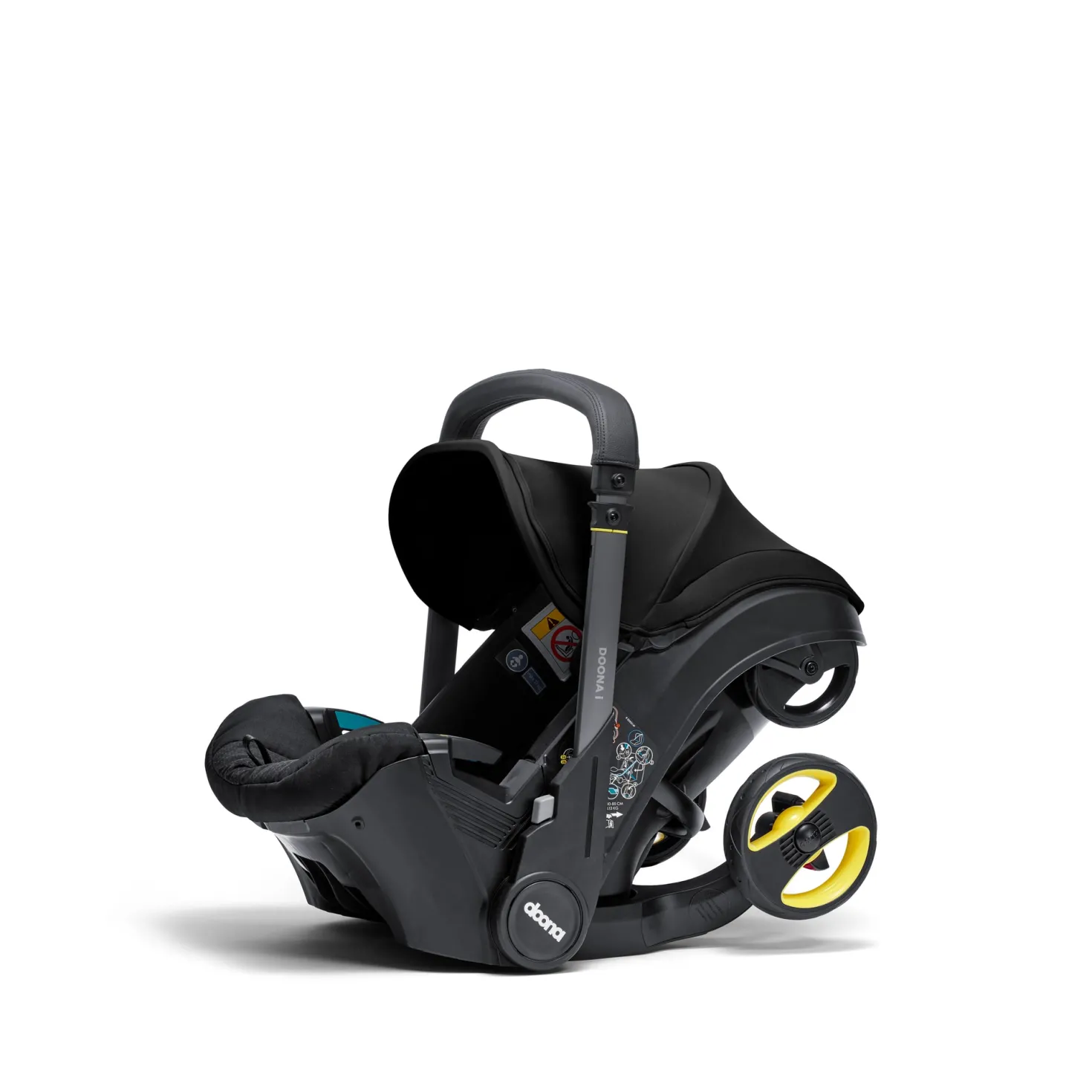 Doona I Babyskydd Och Barnvagn I Ett Nitro Black