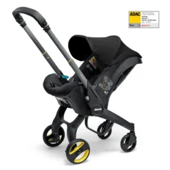 Doona I Babyskydd Och Barnvagn I Ett Nitro Black